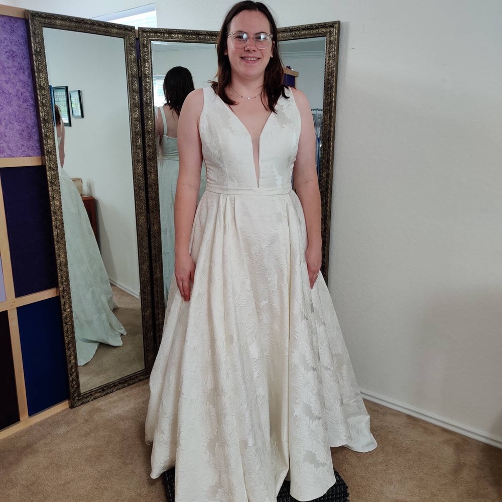 Sherri Hill ivory dress.